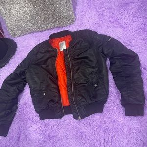 Bomber jacket with minor ink stain